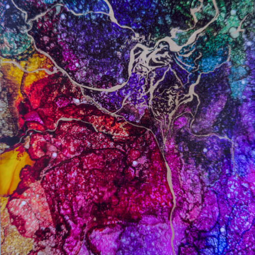 abstract artwork featuring vibrant swirls and patches of red, yellow, purple, blue, and green with white branching lines resembling rivers or roots. the colors blend and overlap in a textured, dynamic pattern.